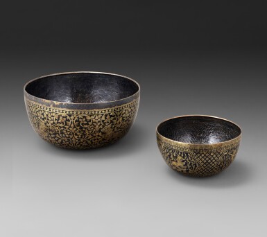 View full screen - View 1 of Lot 27. Two rare gold niello-inlaid silver bowls, Kingdom of Siam, 19th century | 暹邏十九世紀 鎏金銀錯黑金花卉紋砵兩件.