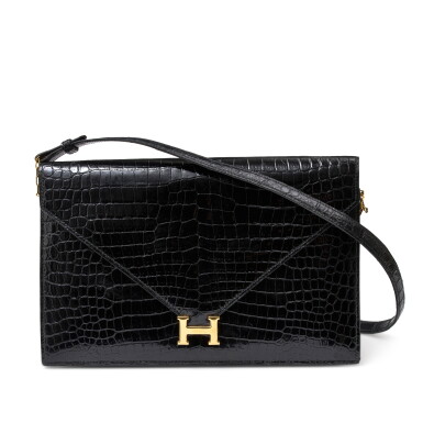 View full screen - View 1 of Lot 1049. Noir Shiny Porosus Crocodile Lydie Gold Hardware, c 1980's.