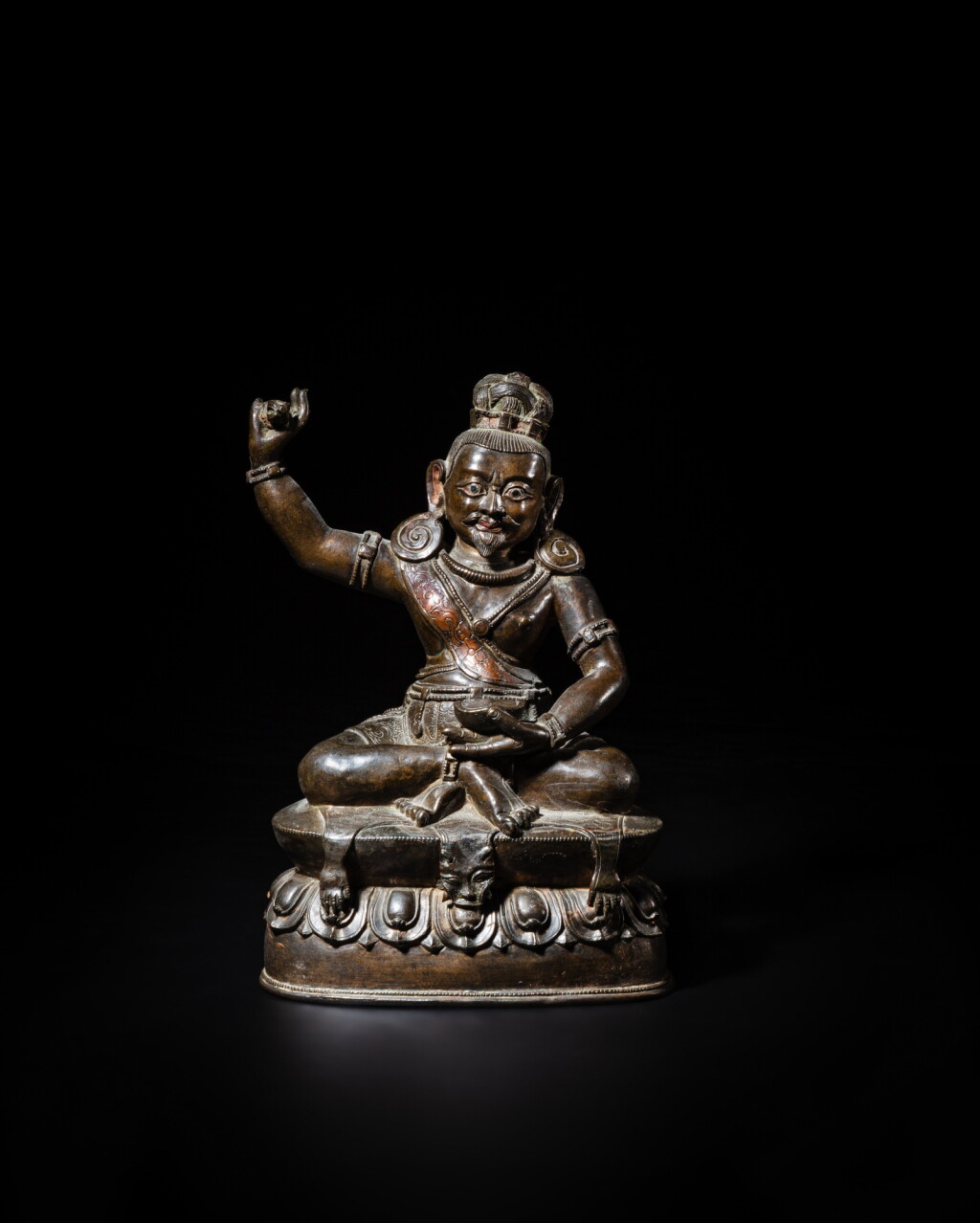 View full screen - View 1 of Lot 5. A silver and copper-inlaid copper alloy seated figure of Tsangnyön Heruka, Tibet, circa 16th century | 約十六世紀 藏傳銅合金錯銀銅赫魯嘎坐像.