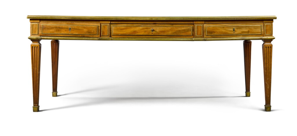 View full screen - View 1 of Lot 45. A Louis XVI gilt-bronze mounted mahogany bureau plat, stamped E. Levasseur JME, late 18th century.