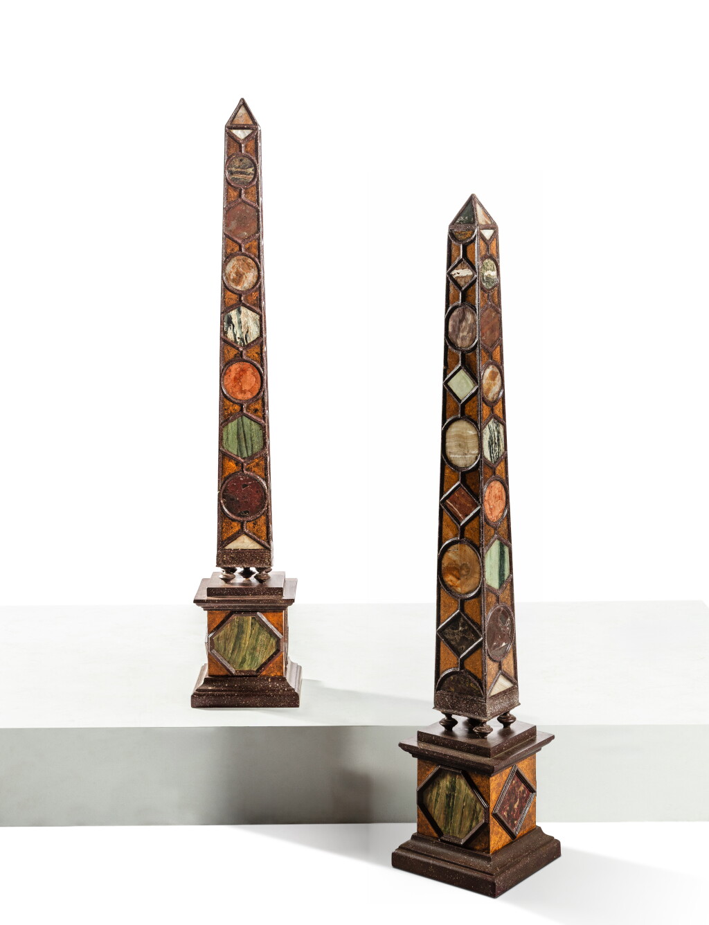 View full screen - View 1 of Lot 12. A pair of marbles, painted wood and mother-of-pearl obelisks, attributed to Renzo Mongiardino, last third of 20th century.