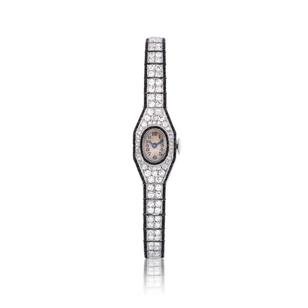 View full screen - View 1 of Lot 33. Montre bracelet de dame diamants et onyx | Lady's diamond and onyx bracelet watch.