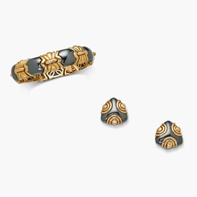 View full screen - View 1 of Lot 423. Gold and Hematite Bracelet and Pair of Earclips.