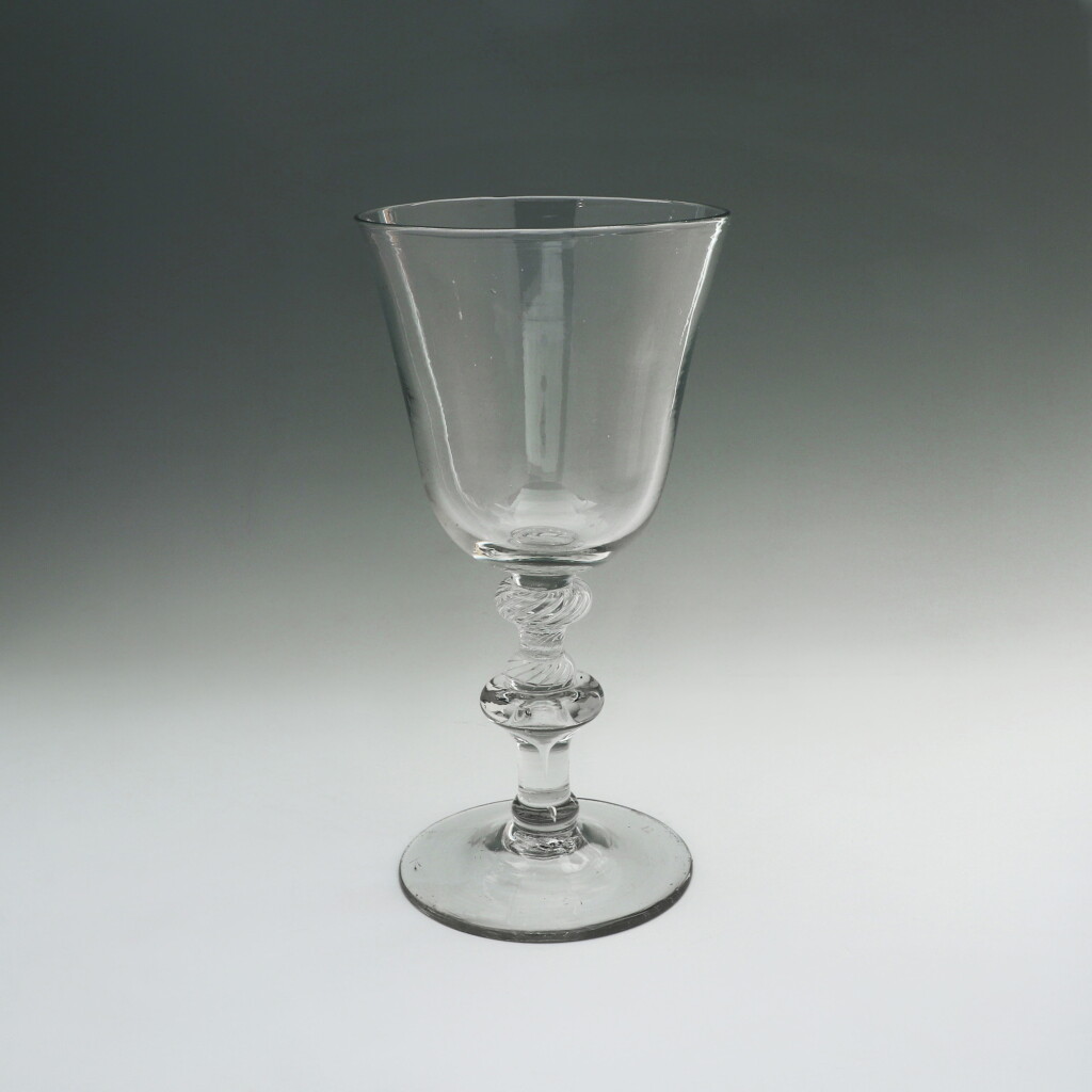 View full screen - View 1 of Lot 11. A LARGE GEORGIAN GLASS GOBLET | CIRCA 1750.