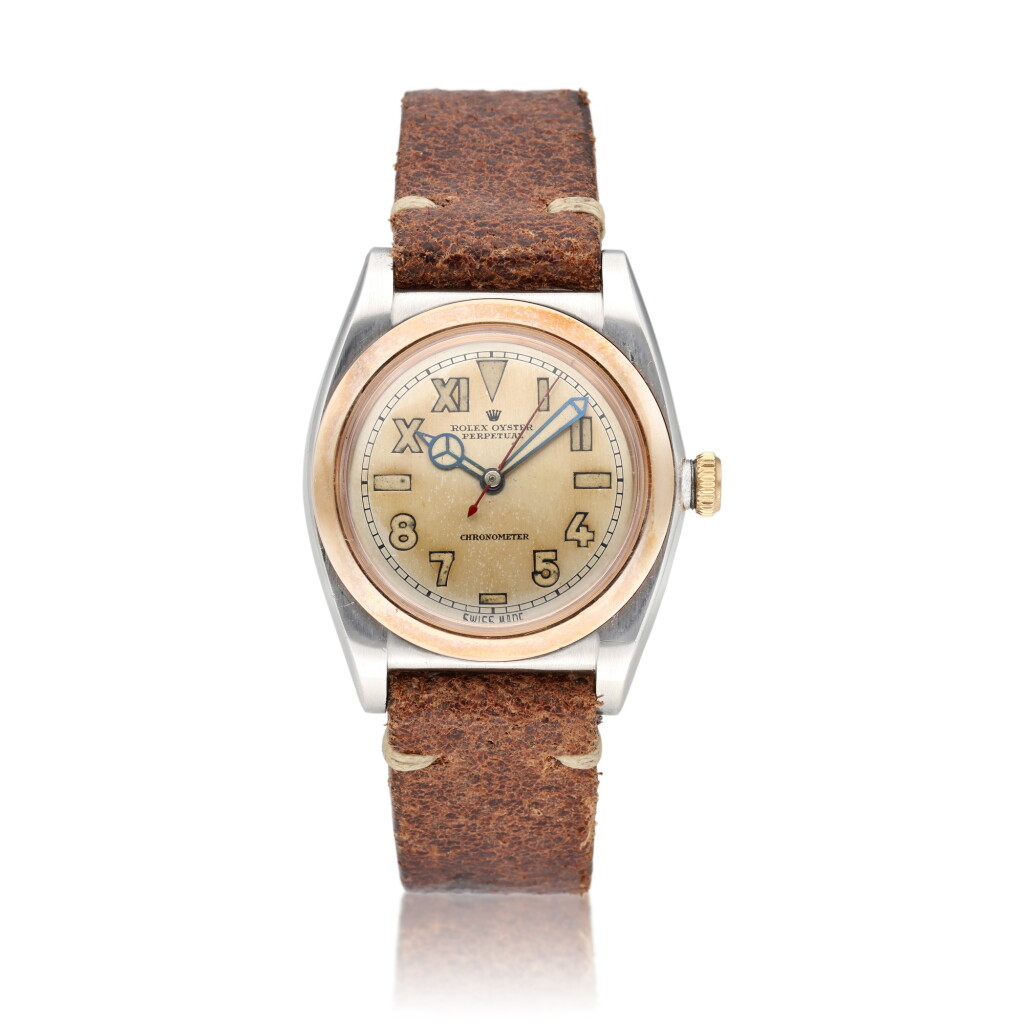 View full screen - View 1 of Lot 385. Reference 3133 Oyster Perpetual Bubbleback | A pink gold and stainless steel automatic wristwatch, Circa 1944.