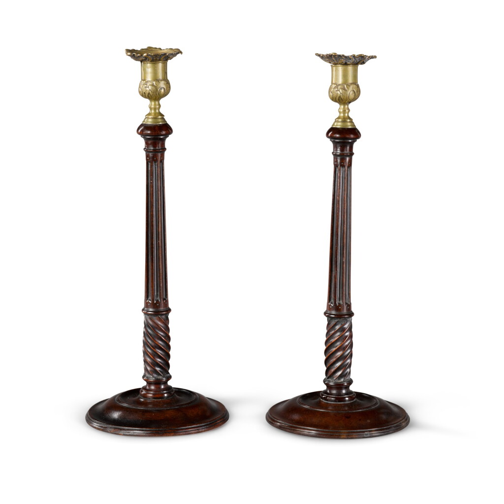 View full screen - View 1 of Lot 149. A pair of George III turned mahogany candlesticks, circa 1770.