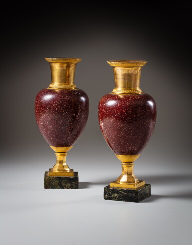 View full screen - View 1 of Lot 57. A pair of ovoid-shaped gilt-bronze mounted porphyry painted marble vases, circa 1820 | Paire de vases ovoïdes en marbre peint façon porphyre rouge et bronze doré, vers 1820.