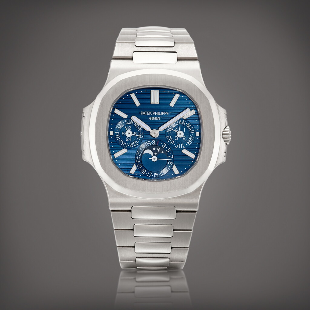 View full screen - View 1 of Lot 2295. Nautilus, Reference 5740 A white gold perpetual calendar bracelet watch with moon phases, 24 hours and leap year indication, Circa 2021 | 百達翡麗 | Nautilus 型號5740 | 白金萬年曆鏈帶腕錶,備月相、24小時及閏年顯示,約2021年製.