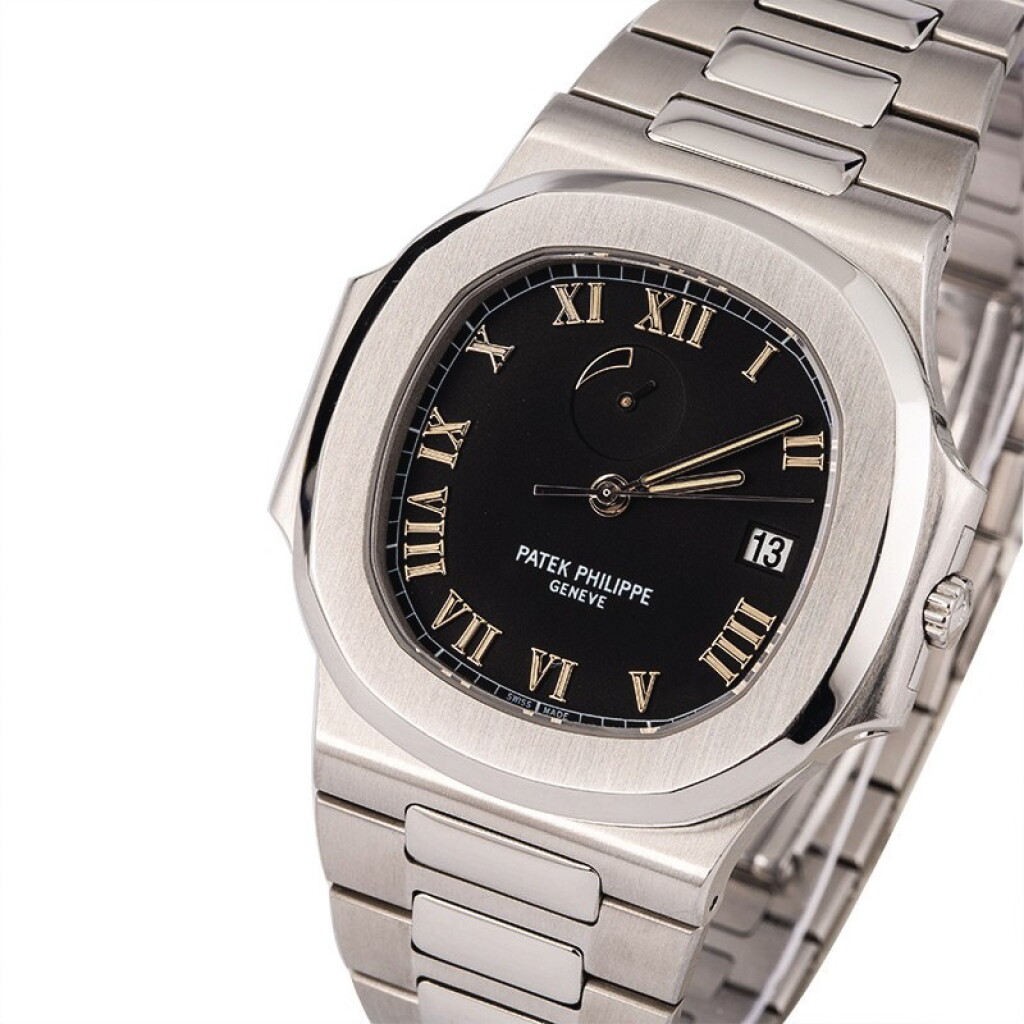 View full screen - View 1 of Lot 17. PATEK PHILIPPE | Nautilus, Ref. 3710/1A, A Stainless Steel Wristwatch with Integrated Bracelet and Power Reserve Indicator, Circa early 2000s.