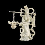 A large white jade figure of He Xiangu | 白玉荷仙姑立像