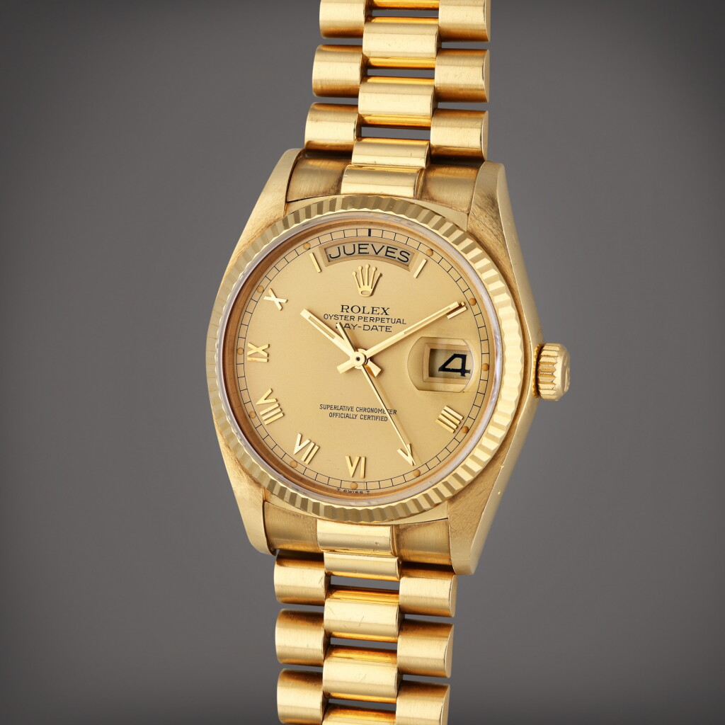 View full screen - View 1 of Lot 519. Reference 18038 Day-Date | A yellow gold automatic wristwatch with day, date, and bracelet, Circa 1979.