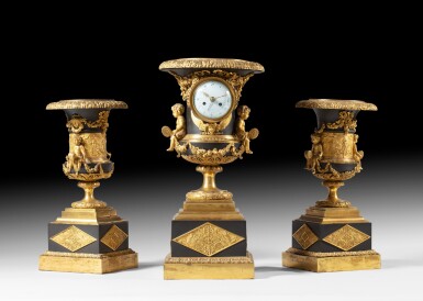 View full screen - View 1 of Lot 137. A patinated and gilt-bronze garniture de cheminée, French Empire, circa 1810 | Garniture de cheminée en bronze patiné et doré d'époque Empire, vers 1810.
