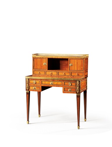View full screen - View 1 of Lot 129. A Louis XVI gilt-bronze mounted tulipwood and amaranth bonheur-du-jour | Bonheur du jour en placage de bois de rose, d'amarante et bronze doré d'époque Louis XVI.