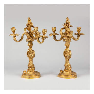 View full screen - View 1 of Lot 174. A PAIR OF ROCOCCO GILT BRONZE THREE-LIGHT CANDELABRA AFTER A DESIGN BY MEISSONNIER, 19TH CENTURY.