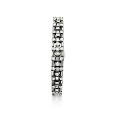 View full screen - View 1 of Lot 97. A LADY'S PLATINUM AND DIAMOND SET BRACELET WATCH WITH CONCEALED DIAL, CIRCA 1940’S.