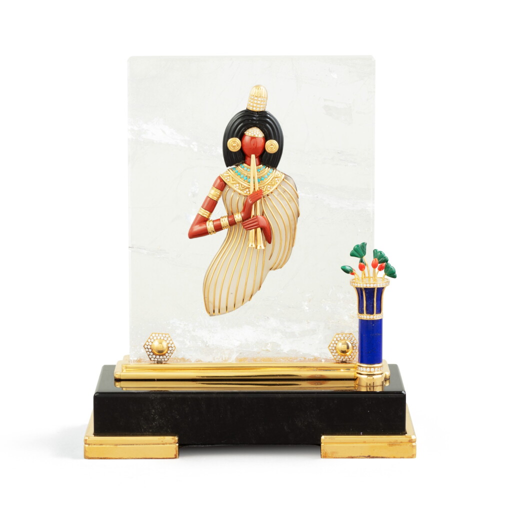 View full screen - View 1 of Lot 29. A French obsidian, rock-crystal, silver-gilt and lapis sculpture representing a musician, Mellerio, Paris, 2001 | Sculpture représentant une musicienne en pierres dures, vermeil, lapis et cristal de roche, par Mellerio, Paris, 2001.