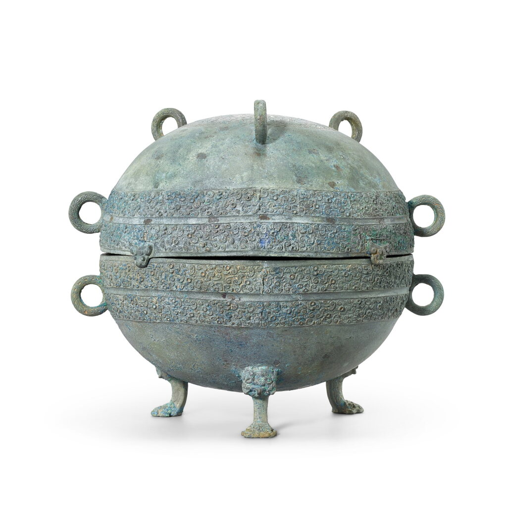 View full screen - View 1 of Lot 3051. An archaic bronze ritual food vessel, Dui, Spring and Autumn period | 春秋 青銅蟠螭紋獸足敦.
