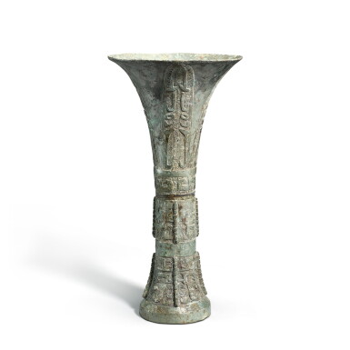 View full screen - View 1 of Lot 536. A bronze 'mask' ritual wine vessel, gu, Western Zhou dynasty or later 西周或以後 青銅獸面紋觚.
