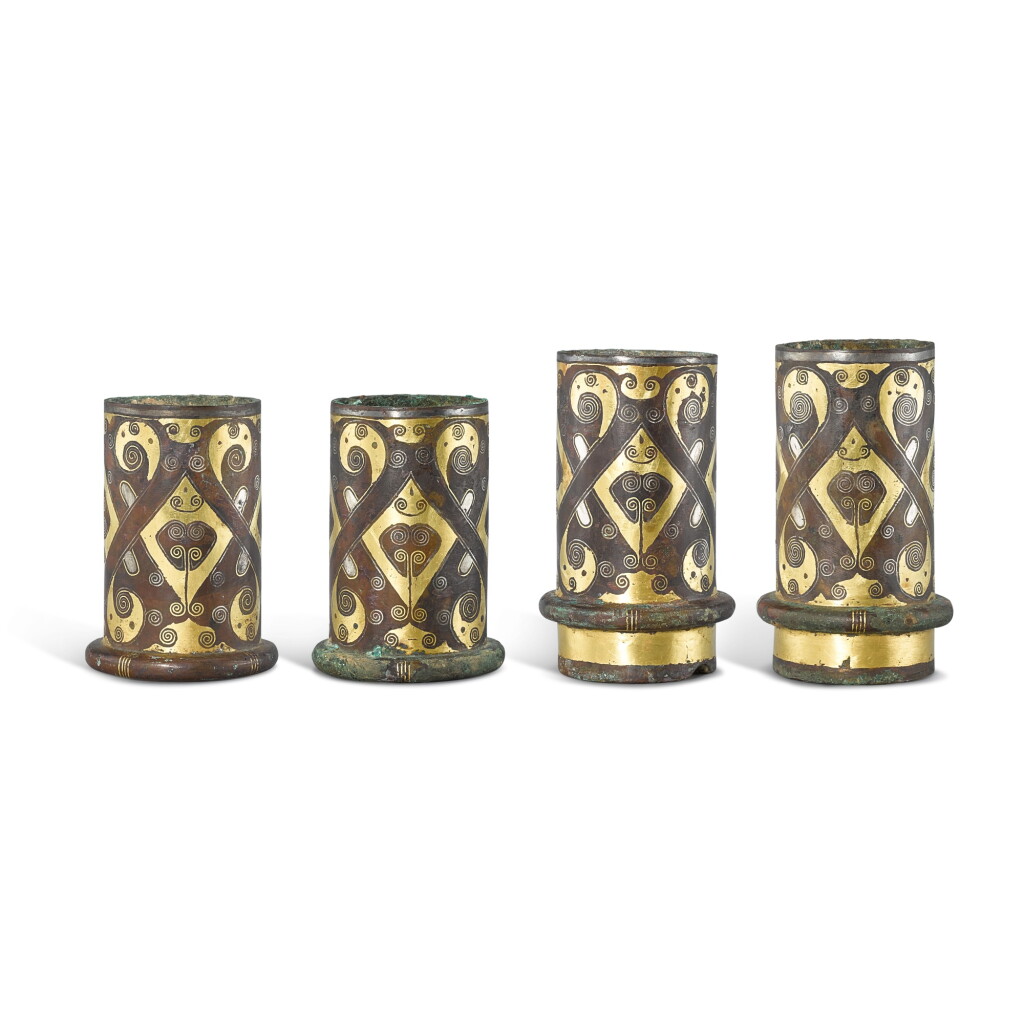 View full screen - View 1 of Lot 873. Four gold and silver-inlaid bronze chariot fittings, Eastern Zhou dynasty, Warring States period - Han dynasty 東周戰國時期至漢 銅錯金銀車馬飾四件.