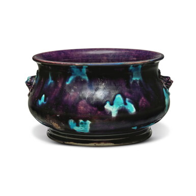 View full screen - View 1 of Lot 1110. A large aubergine-glazed turquoise-splashed censer, Qing dynasty, Kangxi period | 清康熙 茄皮紫釉孔雀藍斑獅首耳爐.