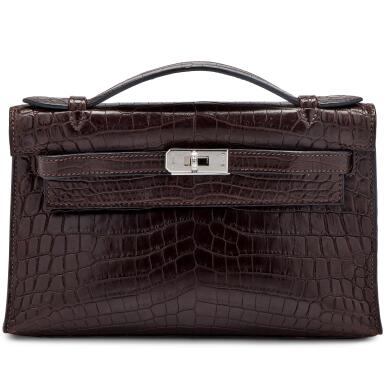 View full screen - View 1 of Lot 1218. Marron Fonce Matte Niloticus Crocodile Kelly Pochette with Diamonds and White Gold, 2006.
