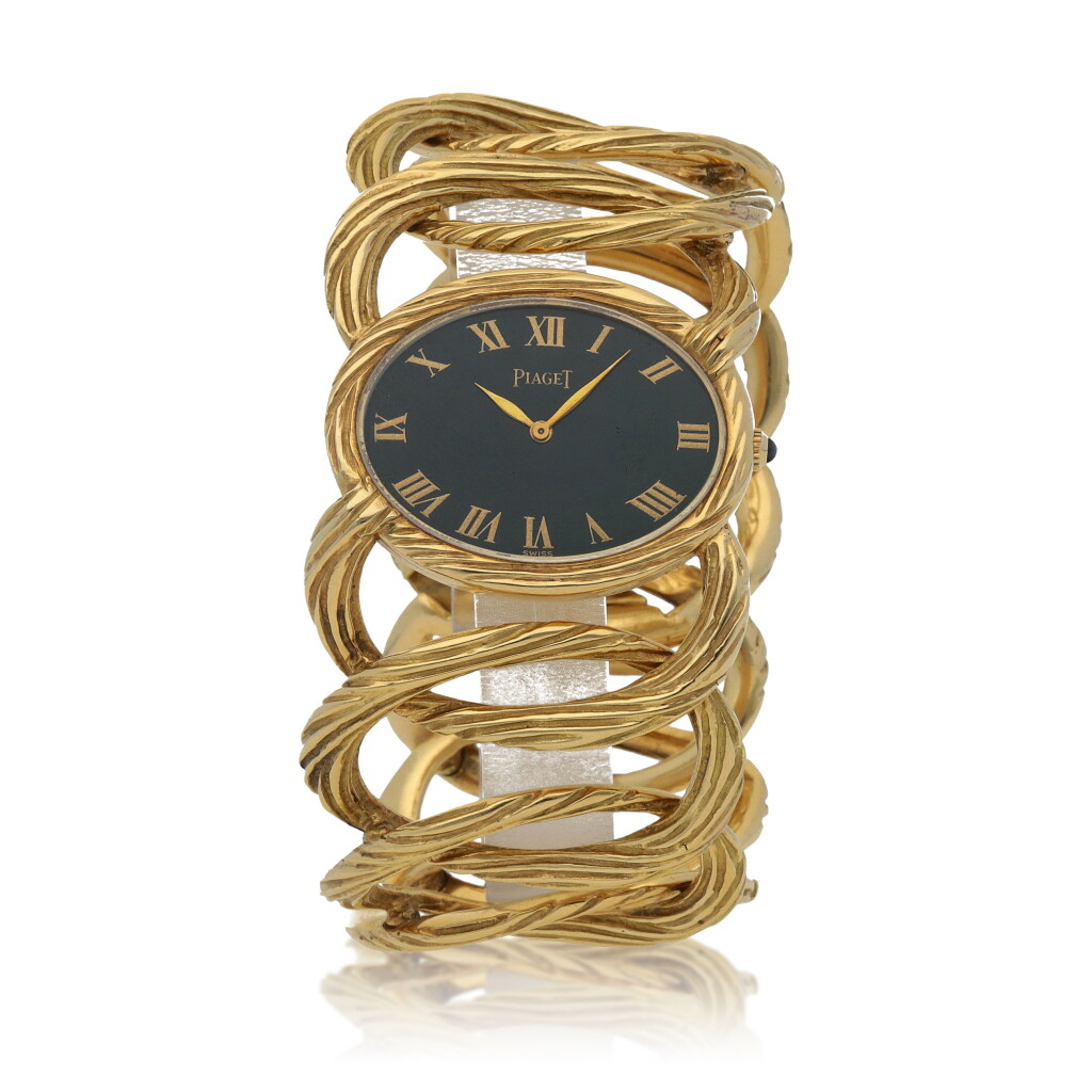 View full screen - View 1 of Lot 462. Ref. 9652 D65 Yellow gold bracelet watch Circa 1970.