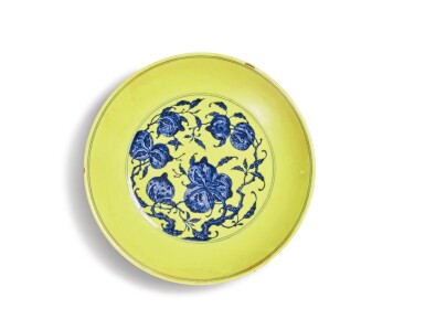 View full screen - View 1 of Lot 265. A Ming-style yellow-ground underglaze blue 'nine peaches' dish, Seal mark and period of Qianlong | 清乾隆 黃地青花九桃紋大盤 《大清乾隆年製》款.