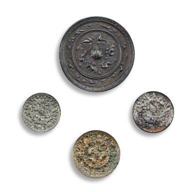 View full screen - View 1 of Lot 3603. A gilt-bronze and three bronze 'grape and beasts' mirrors, Tang dynasty | 唐 銅鎏金海獸葡萄紋鏡一件 及 銅海獸葡萄紋鏡三件.
