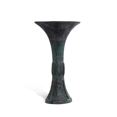 View full screen - View 1 of Lot 712. A bronze ritual wine vessel, gu, Late Shang dynasty | 商晚期 青銅獸面紋觚.