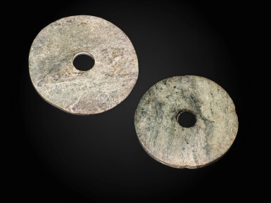 View full screen - View 1 of Lot 73. Two large calcified pale green bi discs Probably Neolithic period | 或為新石器時代 玉璧兩件.