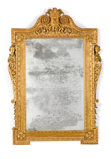 View full screen - View 1 of Lot 57. A GEORGE II CARVED GILTWOOD MIRROR, CIRCA 1735.