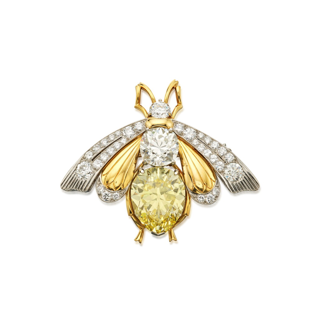 View full screen - View 1 of Lot 173. Fancy Intense Yellow Diamond and Diamond Brooch.