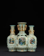 A highly important and unique celadon-ground yangcai 'hunting scene' conjoined and reticulated vase, Seal mark and period of Qianlong, Possibly made in 1754 according to Qing court record | 清乾隆 御製洋彩粉青地描金內狩獵圖三元轉旋瓶 《大清乾隆年製》款 據錄或製於乾隆十九年