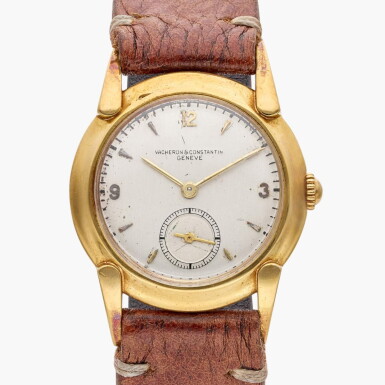 View full screen - View 1 of Lot 546. A yellow gold wristwatch with fancy lugs, Circa 1945.