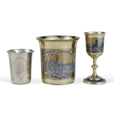 View full screen - View 1 of Lot 585. A Group of Three Silver, Silver-Gilt and Niello Beakers, Zaviyanov and Others, Moscow, 1840s and Late 19th Century.