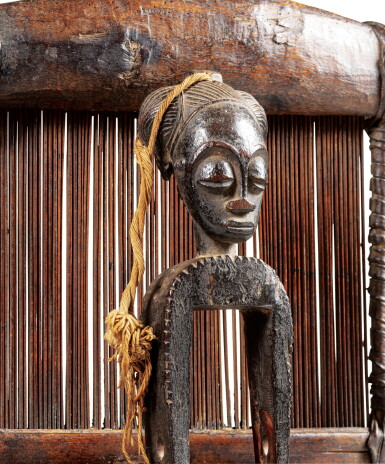 View full screen - View 1 of Lot 97. Poulie et élément de métier à tisser, Baulé, Côte d'Ivoire | Baule pulley and loom element, Ivory Coast.