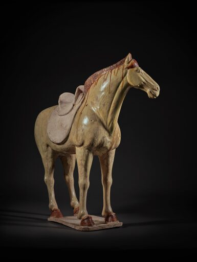 View full screen - View 1 of Lot 208. A straw and chestnut-glazed pottery figure of a horse, Tang dynasty.
