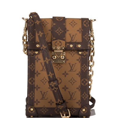View full screen - View 1 of Lot 103. LOUIS VUITTON | REVERSE MONOGRAM POCHETTE TRUNK VERTICALE OF COATED CANVAS WITH POLISHED BRASS HARDWARE.