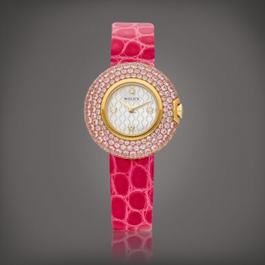 View full screen - View 1 of Lot 2218. Cellini Orchid, Reference 6201 | A yellow gold, diamond and pink sapphire-set wristwatch with mother-of-pearl dial, Circa 2001 | 勞力士 | Cellini Orchid 型號6201 | 黃金鑲鑽石及粉紅色藍寶石腕錶,備珠母貝錶盤,約2001年製.