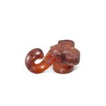 An agate 'mythical beast' belt hook, Han dynasty 漢 瑪瑙獸面紋帶鉤