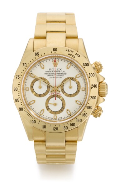 View full screen - View 1 of Lot 9. ROLEX | DAYTONA, REFERENCE 116528, YELLOW GOLD CHRONOGRAPH WRISTWATCH WITH BRACELET, CIRCA 2002.