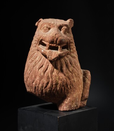 View full screen - View 1 of Lot 152. A mottled red sandstone head of a lion, Central India, Mathura, 2nd century.