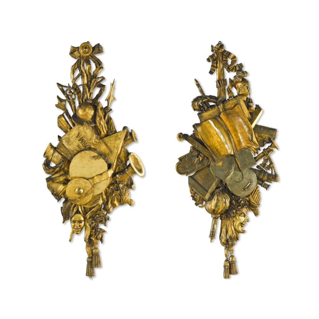 View full screen - View 1 of Lot 124. A pair of carved giltwood trophies, mid-19th century.