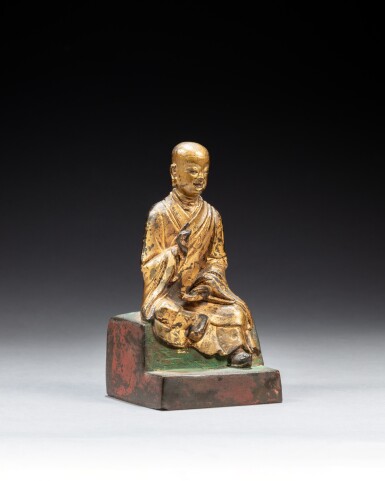 View full screen - View 1 of Lot 227. An inscribed gilt-bronze figure of the Eighteenth Patriarch Gayasata, Ming dynasty, 16th / 17th century | 明十六 / 十七世紀 銅鎏金第十八祖伽耶舍多坐像.