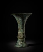 An inscribed archaic bronze ritual wine vessel (Gu), Late Shang dynasty | 商末 青銅饕餮紋觚