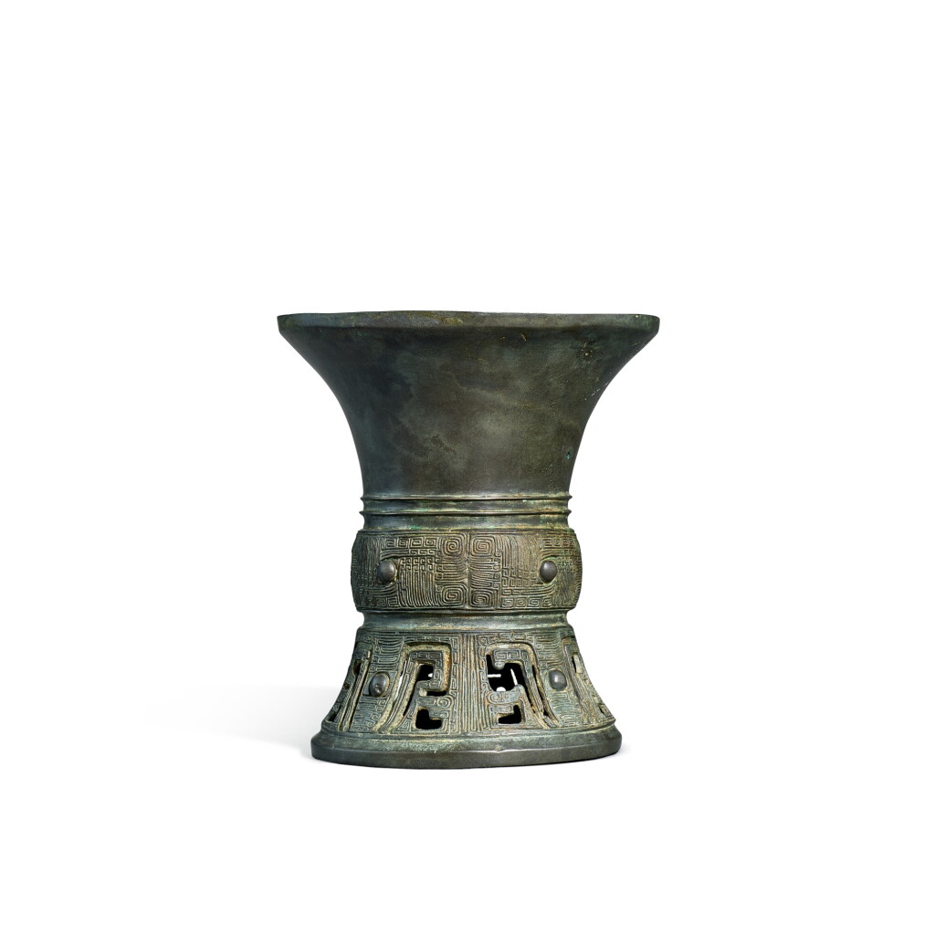 View full screen - View 1 of Lot 3587. A bronze reticulated ritual wine vessel, gu, Eastern Zhou dynasty, Warring States period | 東周戰國 青銅觚.