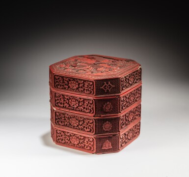 View full screen - View 1 of Lot 119. A carved cinnabar lacquer three-tiered hexagonal box and cover, Qing dynasty, 18th / 19th century | 清十八 /十九世紀 剔紅方勝形三層蓋盒.
