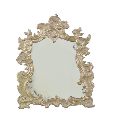 View full screen - View 1 of Lot 143. AN ITALIAN ROCOCO STYLE REPOUSSE SILVERED-BRASS MIRROR, MID-19TH CENTURY.