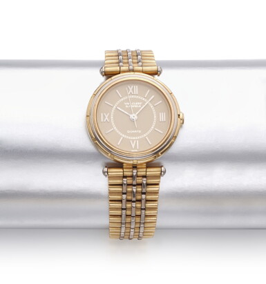 View full screen - View 1 of Lot 877. Lady's gold and enamel wristwatch.