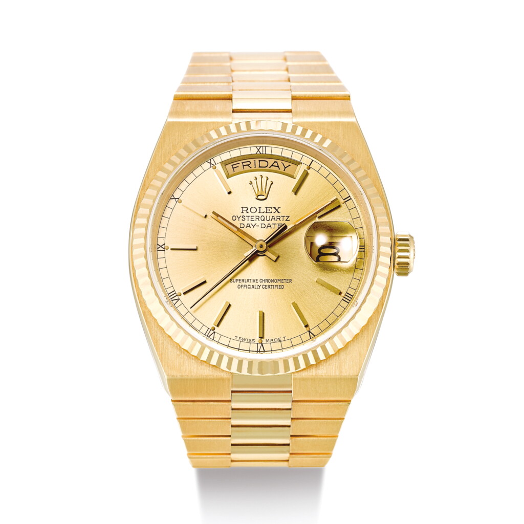 View full screen - View 1 of Lot 2118. ROLEX | OYSTER QUARTZ DAY-DATE, REFERENCE 19018 A YELLOW GOLD WRISTWATCH WITH DAY, DATE AND BRACELET, CIRCA 1986" | 勞力士 | Oyster Quartz Day-Date 型號19018 黃金鏈帶腕錶,備日期及星期顯示,機芯編號0125976,錶殼編號9723331,約1986年製".